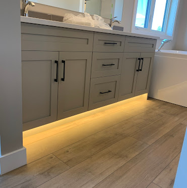 Bathroom vanity with under-cabinet LED accent lighting